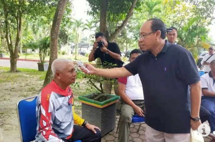 Cegah Penularan Cofid 19, Bupati Asahan dan Jajaran Periksa Suhu Badan