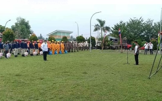  Pj Sekdako Pekanbaru Pimpin Apel Gelar Pasukan Penyemprotan Disinfektan dan Rapid Test Massal