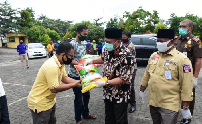  Bupati Kampar Apresiasi  Kontribusi THL Tanggulangi Covid-19