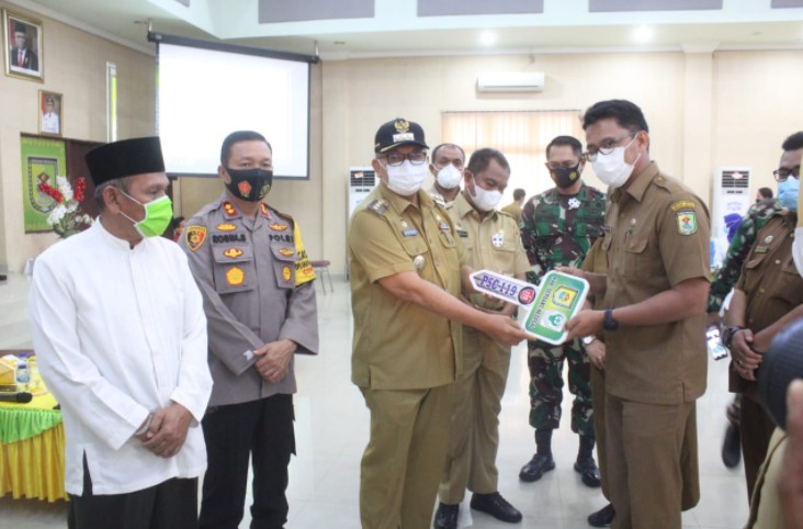 Kapolres Sergai Hadiri Sosialisasi Vaksinasi Covid-19 Sekaligus Penyerahan Mobil Ambulans dan Mobil Promosi Kesehatan