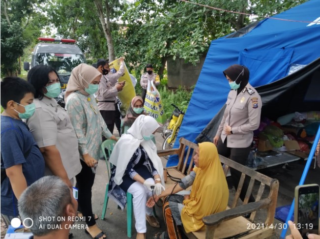  Peduli Korban Banjir, Polresta Pekanbaru Berikan Pengobatan Gratis