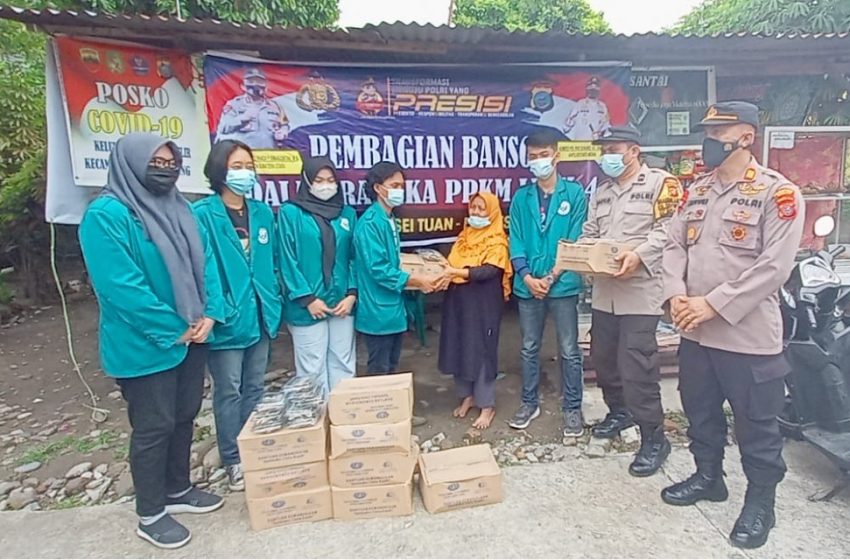 Polsek Percut Sei Tuan Salurkan Bansos Untuk Masyarakat Medan Tembung