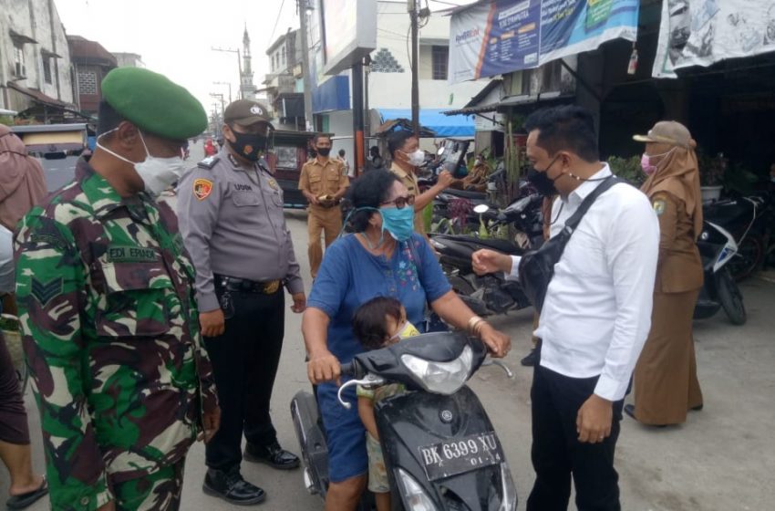  Team Gempur Polsek Tanjung Beringin Sosialisasikan Penerapan Prokes dan PPKM Level 3