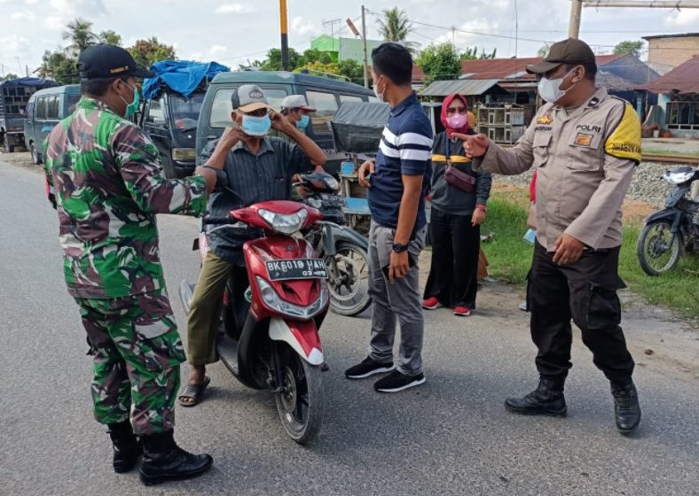  Tim Gempur Covid-19 Polsek Perbaungan Gelar Operasi Yustisi