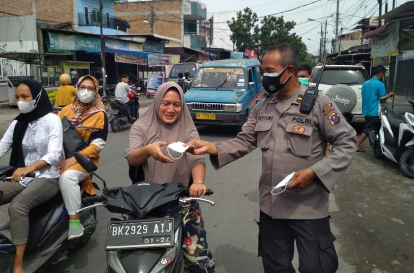  Polsek Medan Area Gelar Operasi Yustisi dan Bagikan Masker Gratis