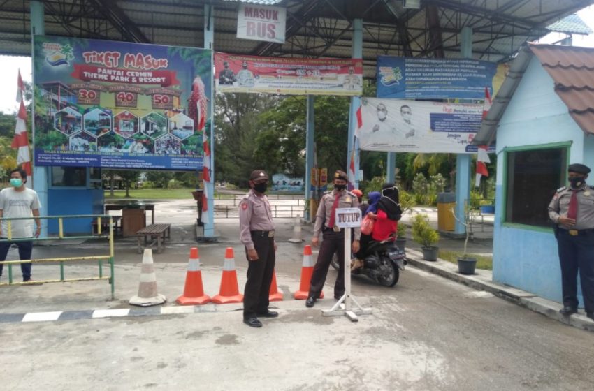  Cegah Penyebaran Virus Covid-19, Polsek Pantai Cermin Imbau Pengelolah Wisata Pantai Tutup Sementara