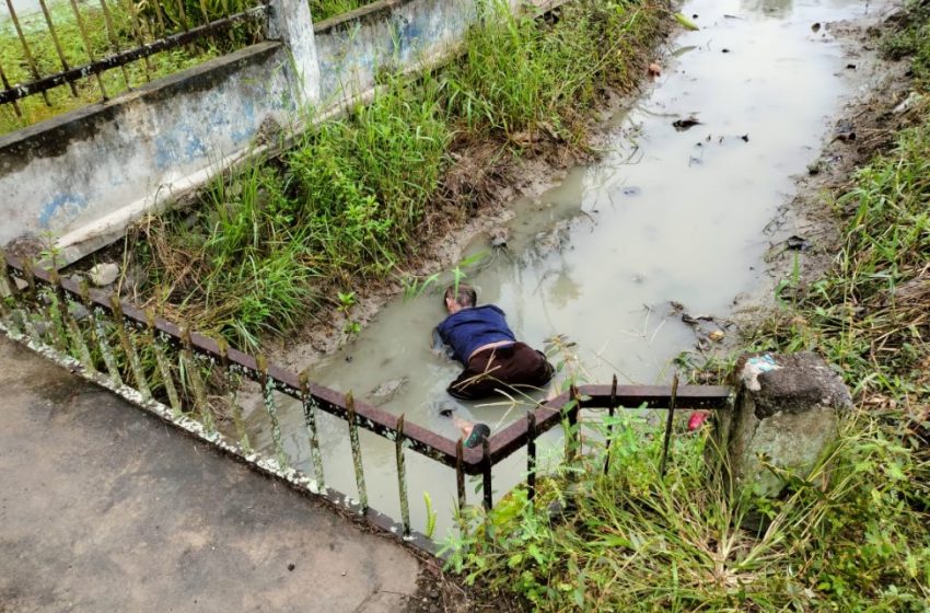  Usai Minum Tuak, Pria Paruh Baya Ditemukan Tewas di Parit Jalan Desa Bakaran Batu