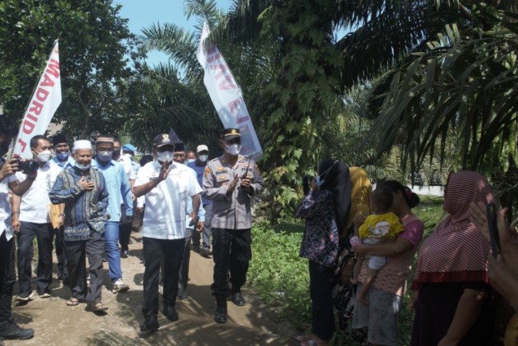  Resmikan Jalan dan Bendungan di Dolok Masihul, Bupati Sergai Imbau Masyarakat Rawat Hasil Pembangunan