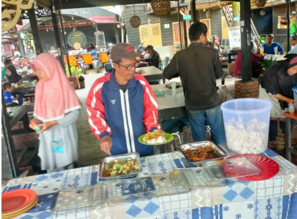  Walaupun Hujan, Kegiatan Jumat Barokah Satreskrim Polres Kampar Tetap Dinanti Warga