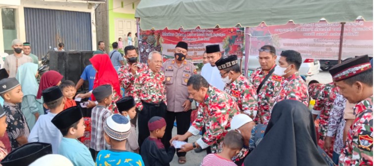  Buka Bersama, Kapolsek Medang Deras Bantu Ratusan Anak Yatim