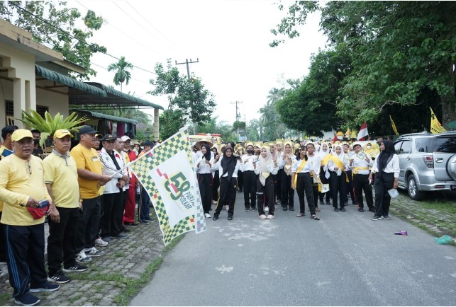  Wakil Bupati Asahan Lepas Gerak Jalan Sehat Gebyar HUT Ke-58 Partai Golkar