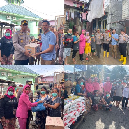 Wakapolrestabes Medan Bantu Warga Terdampak Banjir di Jalan Brigjend Katamso