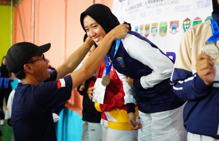 Echa Febriyana Putri Kades Taraman Jaya Boyong Medali Emas Cabor Taekwondo 2023