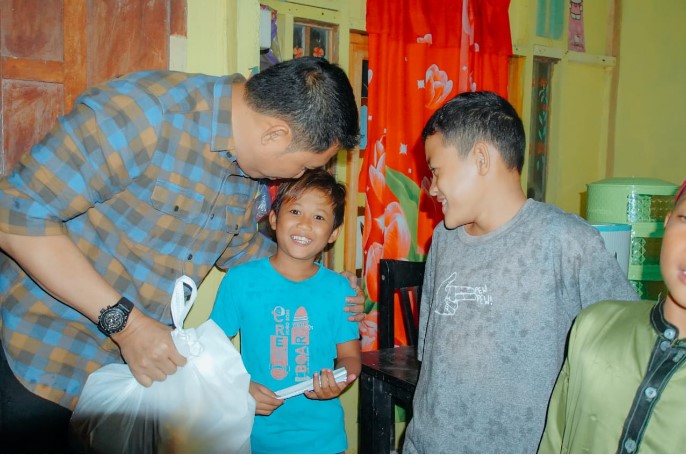  Hujan Keberkahan, Pj Bupati Bersama Kapolres Batubara Santuni Anak Yatim dan Kaum Dhuafa Desa Bandar Rahmad