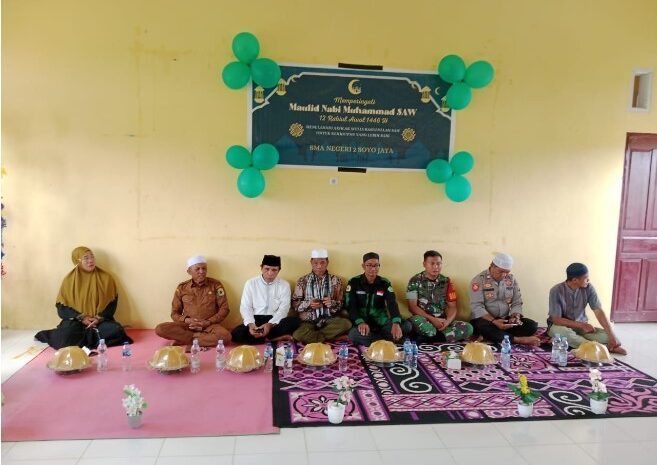  Babinsa Koramil 1311-08/Soyo Jaya Hadiri Peringatan Maulid Nabi Muhammad SAW di SMAN 2 Soyo Jaya