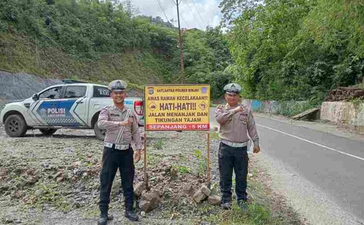  Jelang Natal 2024 Dan Tahun Baru 2025, Satlantas Polres Binjai Pasang Spanduk Imbauan di lokasi Rawan Laka Lantas