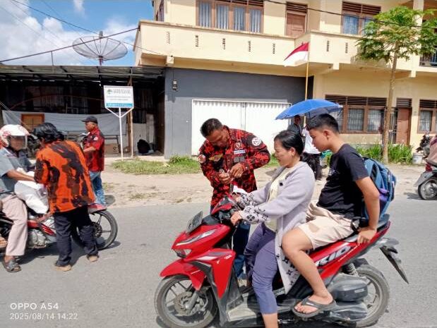  Polres Pakpak Bharat Didukung OKP Pemuda Pancasila Imbau Masyarakat Kibarkan Bendera Merah Putih Jelang Hut RI Ke-80