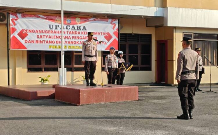  Polres Sibolga Gelar Upacara Penganugerahan Satyalencana Pengabdian dan Bintang Bhayangkara Nararya