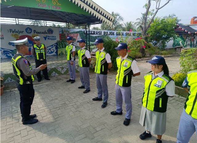  Sat Lantas Polres Pelabuhan Belawan Latih PKS di SMA Negeri 9 Medan