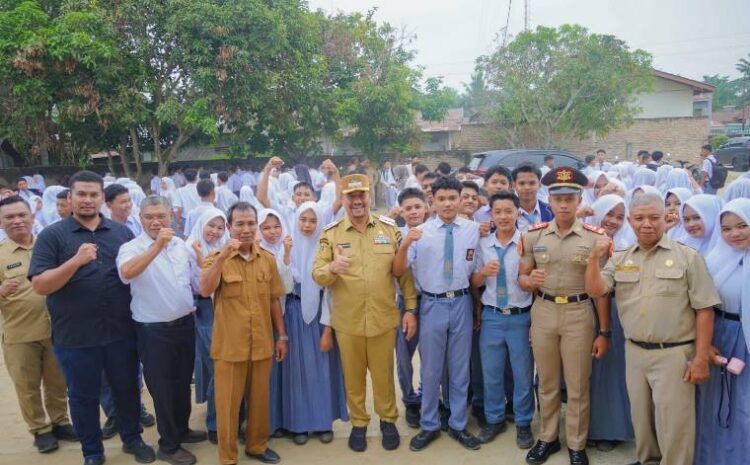  Kunjungi Sekolah di Datuk Tanah Datar, Bupati Dorong Generasi Batu Bara Cerdas dan Berkarakter